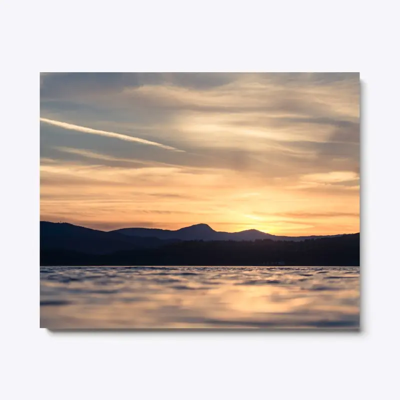 Sunset Over the Ocean and Mountains